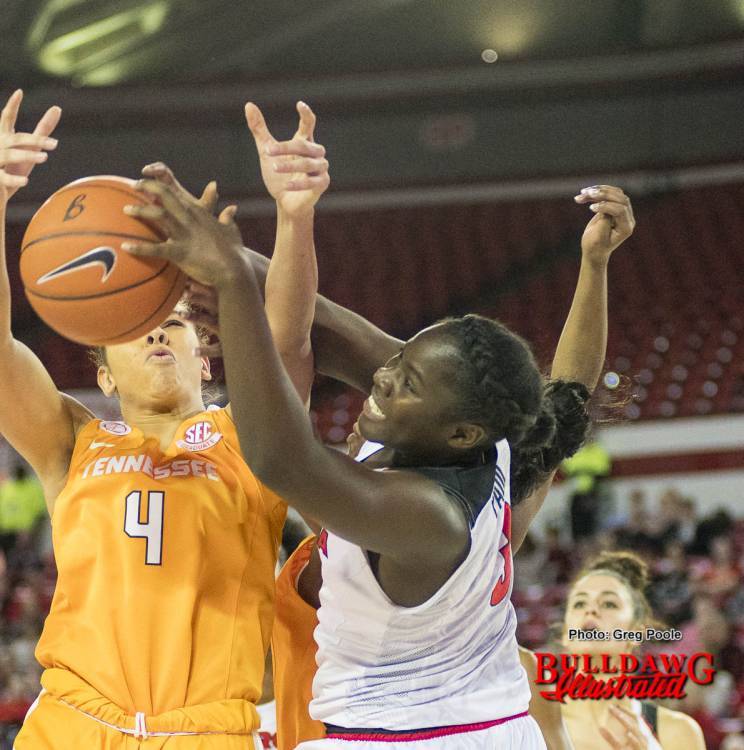 Stephanie Paul fights for an offensive rebound