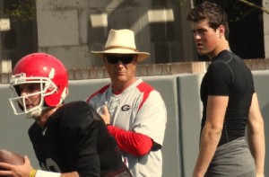 Mark Richt and Jacob Eason watch Faton Bauta