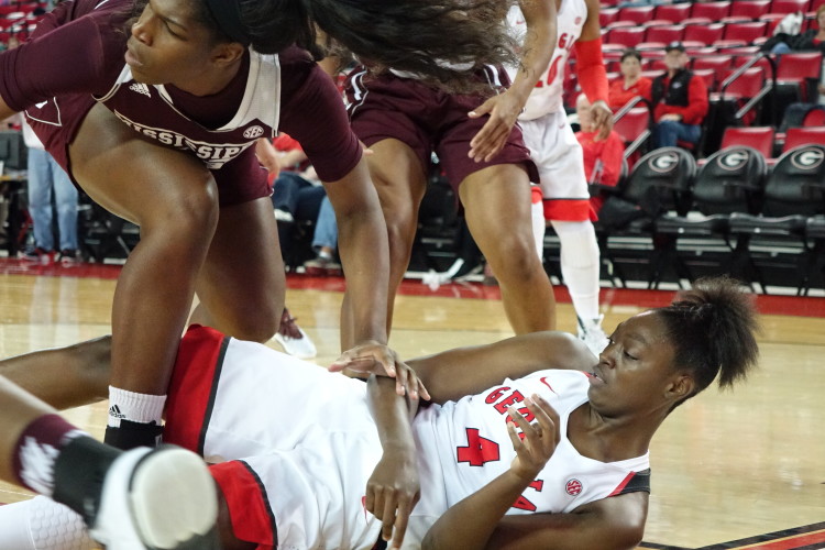 Caliya Robinson fights for the rebound