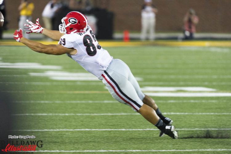 Charlie Woerner lays out for a pass from Jacob Eason