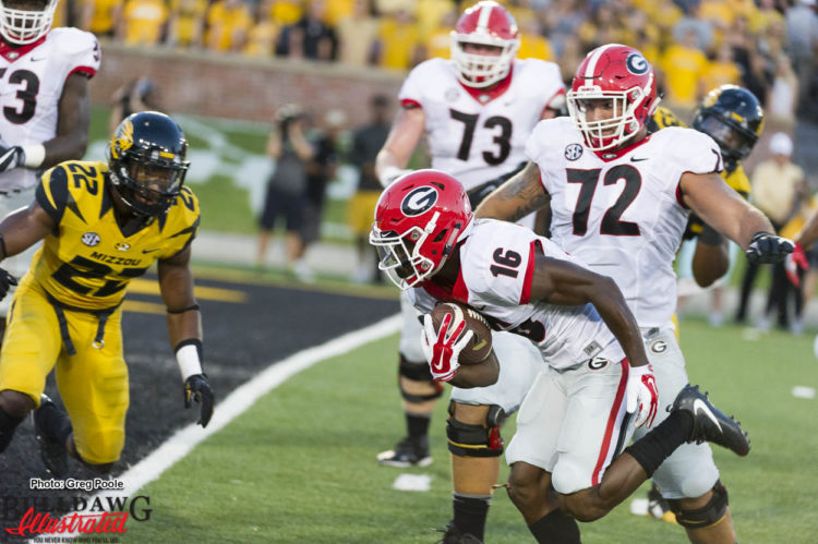 Isaiah McKenzie (16) has his eyes on the prize, the endzone