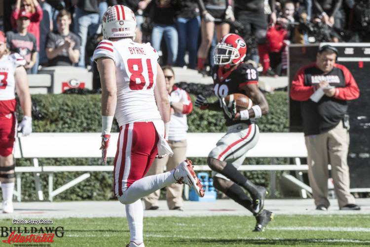 Deandre Baker (18) with the interception