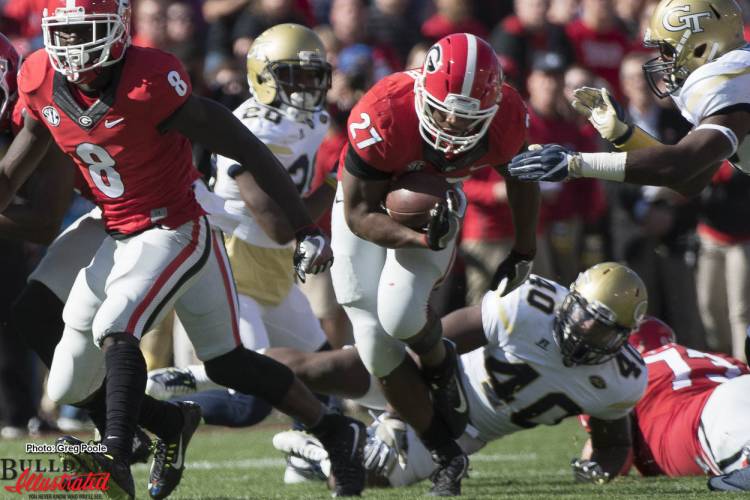 Nick Chubb powers through a hole