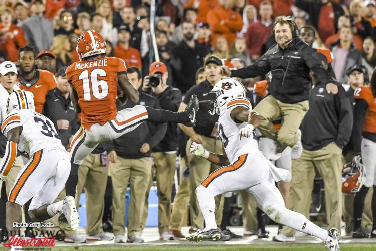 Isaiah McKenzie (16) with a spectacular catch - Kirby Smart with a spectacular sympathy leap