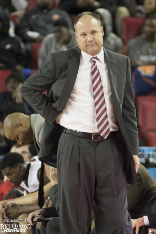 Mark Fox observes the game.