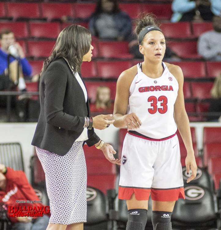 Coach Joni Taylor gives instructions to Mackenzie Engram