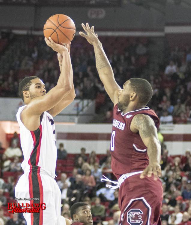 Juwan Parker shoots the ball over a South Carolina defender.