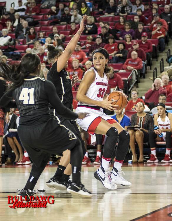 Mackenzie Engram looking to pass to a teammate.