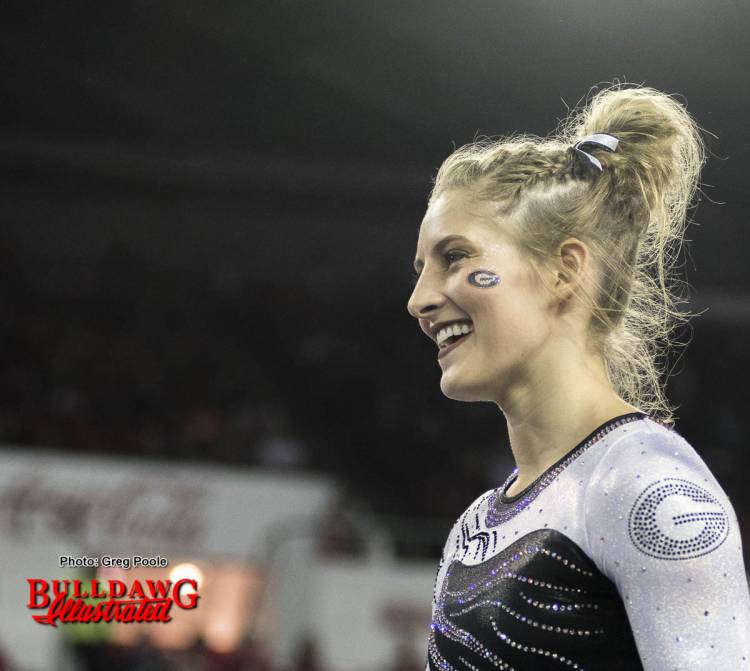 Sydney Snead smiles after a impressive routine.