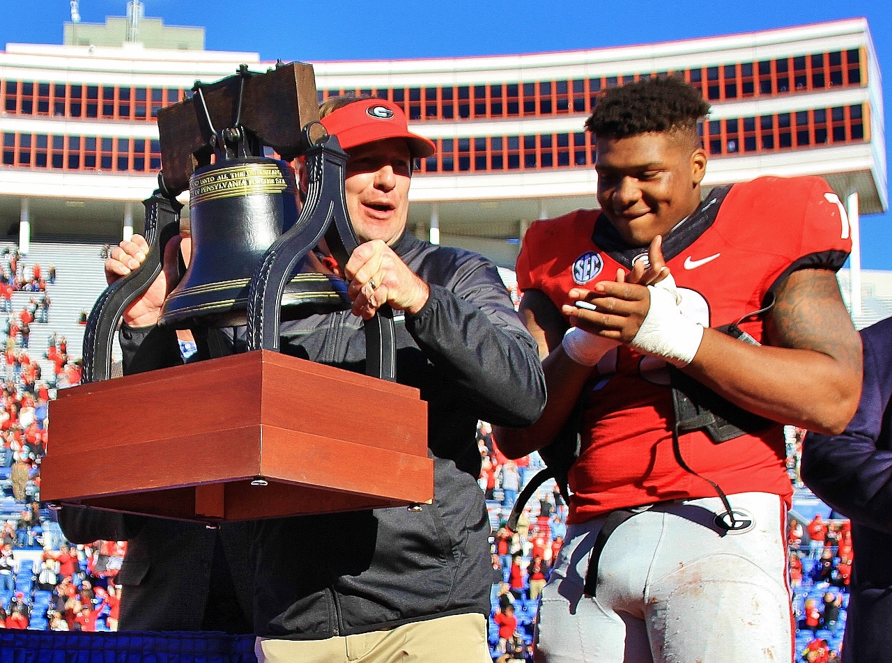 Kirby & Trent Thompson with the Liberty Bowl Trophy - Liberty Bowl - Dawgs 31 TCU 23