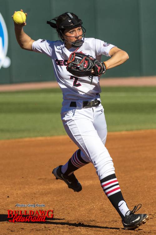 Justice Milz throws the ball into play for an out.