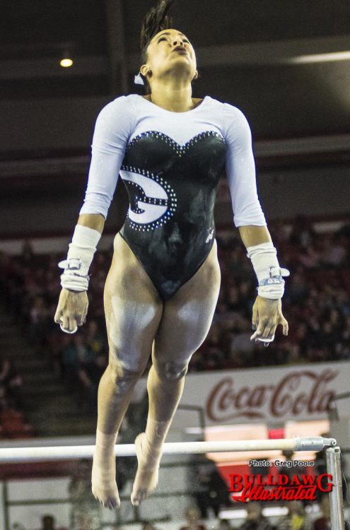 Lauren Johnson finishing up her bars routine.
