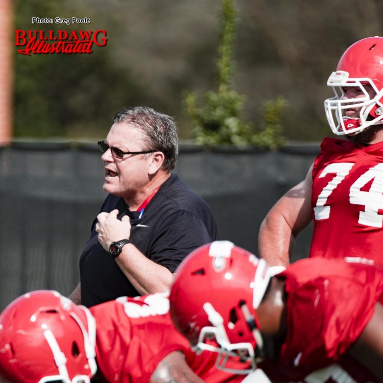 Offensive line coach Sam Pittman and Ben Cleveland (74)
