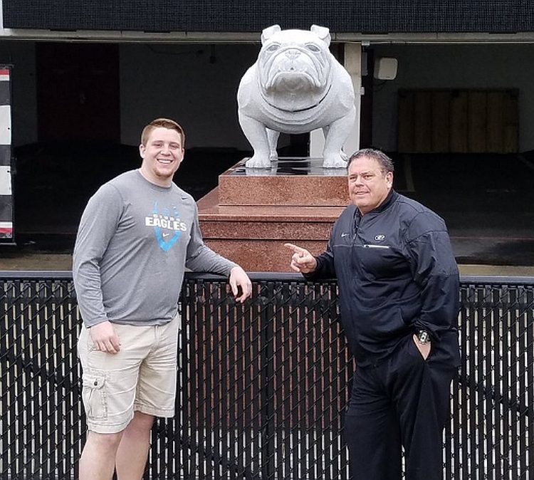 Ollie Lane(left) with UGA OL Coach Sam Pittman (right) (photo from Ollie Lane - Twitter)