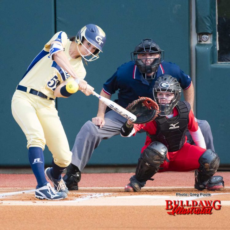 Maeve McGuire makes the stop as the tech player swings and misses