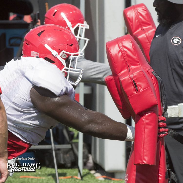 Defense hitting the sled on a hot Tuesday, August afternoon - UGA Fall Camp - Practice No. 20 -