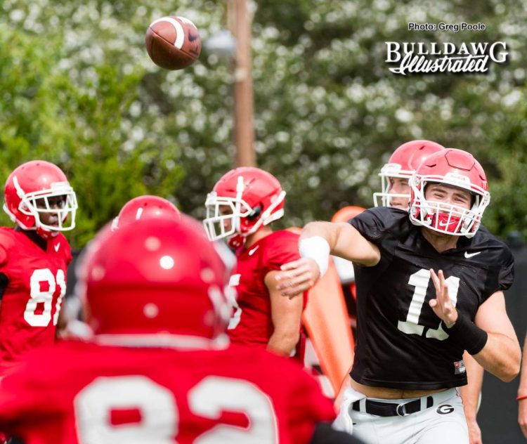 The freshman QB Jake Fromm (11) lets one rip  - UGA football practice, Monday, Aug. 28, 2017 - 