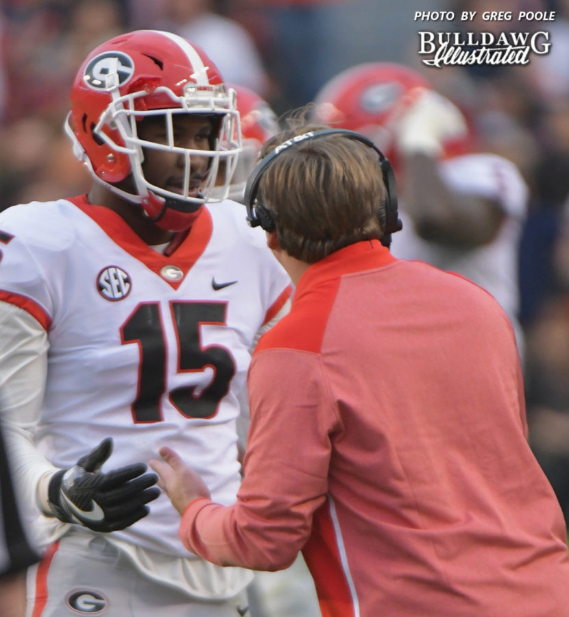D'Andre Walker (15) pleads his case to Head Coach Kirby Smart after a costly penalty during Georgia's 40-17 loss to Auburn on Saturday, Nov. 11, 2017.