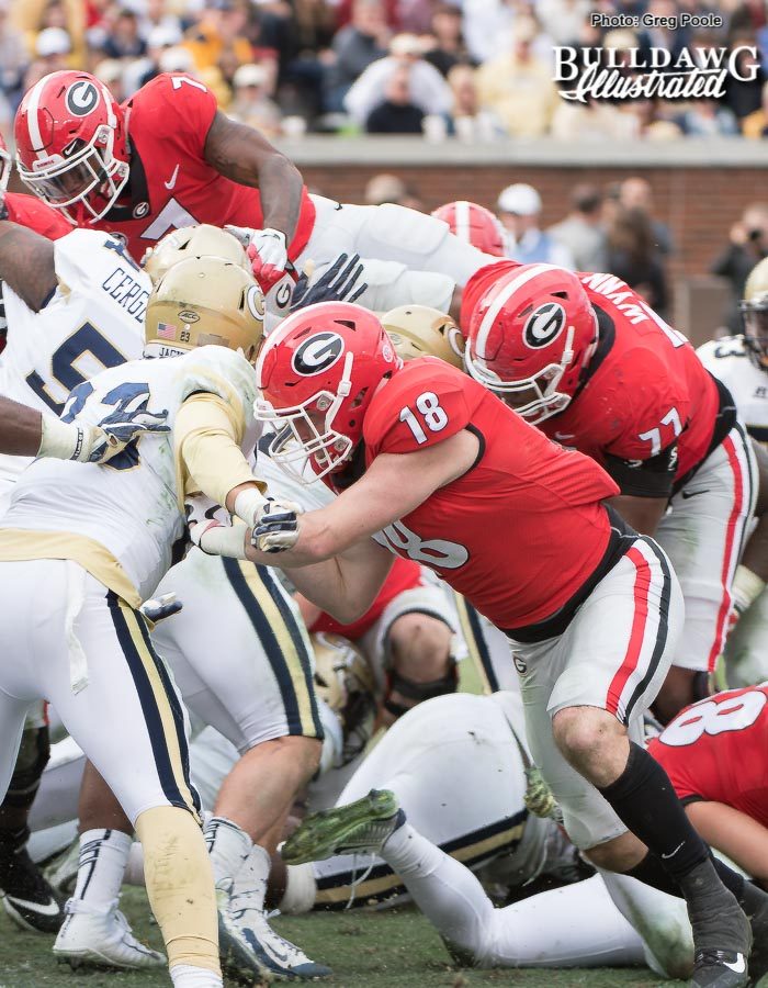 D'Andre Swift (7) goes up and over from 2-yards out to put six on the board for the Bulldogs in the third-quarter. TE Isaac Nauta (18) and OT Isaiah Wynn (77) shown blocking. - UGA vs. GT - Saturday, Nov. 25, 2017 -